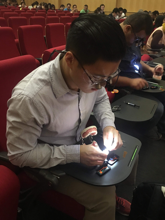 OVC3 hands on workshop Melbourne 2018 Young Dentist Hub dentist working on typodont