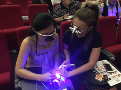 OVC3 hands on workshop Melbourne 2018 Young Dentist Hub dentists working on typodont curing light